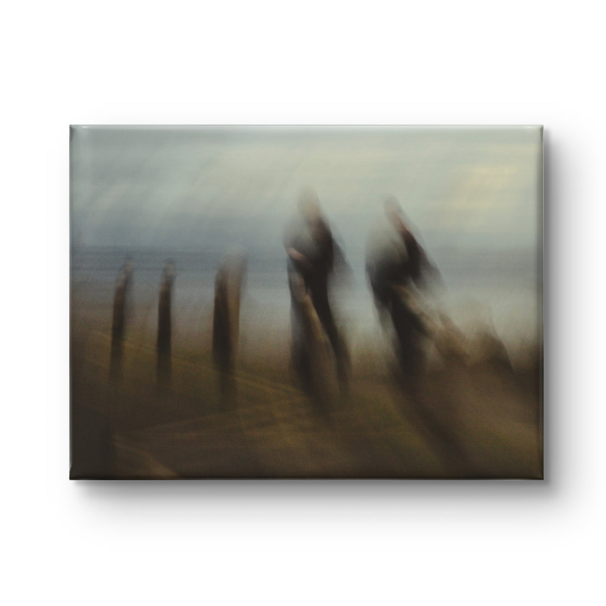 Framed artwork of blurred figures against a misty landscape
